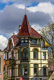 colorful house in Alkmaar against a cloudy sky