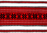 Ukrainian traditional red and black ornament embroidery closeup