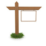 Wooden signboard in the grass