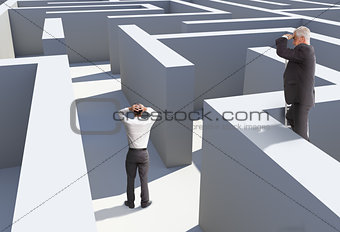 Two businessmen standing in maze