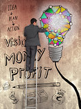 Rear view of businessman touching painted bulb on brown wall