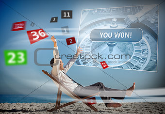 Businessman sitting on deck chair looking at holographic screen and numbers