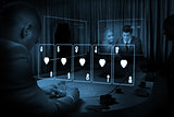Room of people gambling on table in blue light with holographic card display