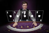 Picture of croupier standing behind holographic cards