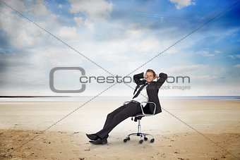 Young businessman sitting on swivel chair