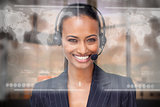Attractive smiling businesswoman using futuristic interface hologram
