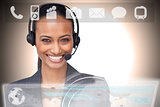 Beautiful smiling businesswoman using futuristic interface showing applications