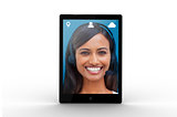 Digital tablet displaying cheerful businesswoman