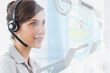 Pleased call center employee using futuristic street map interface