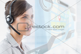 Pleased call center employee using futuristic street map interface