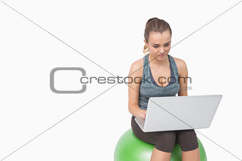 Young woman working with her laptop