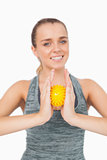 Content woman holding a massage ball between her hands