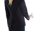 Mid section of blonde businesswoman pointing