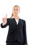 Low angle view of young businesswoman pointing
