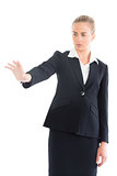 Focused attractive business woman making a gesture