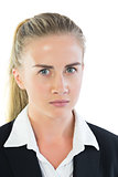 Portrait of annoyed young businesswoman