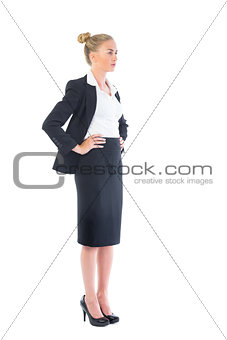 Side view of pretty young businesswoman
