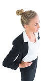 High angle side view of attractive young businesswoman posing