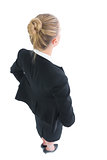 High angle rear view of young businesswoman posing