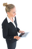 High angle view of attractive businesswoman holding her tablet