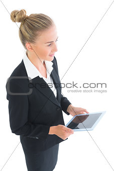 High angle view of attractive businesswoman holding her tablet