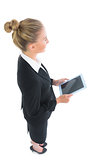 High angle view of young businesswoman holding her tablet