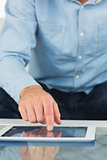 Close up of man using tablet