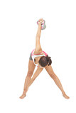 Sporty brunette exercising with kettlebell