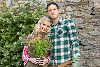 Couple standing in a garden