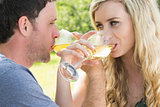 Young couple drinking wine together