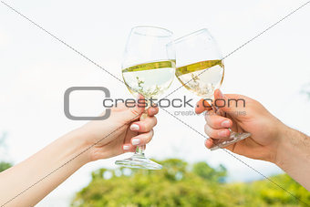 Two glasses being toasted
