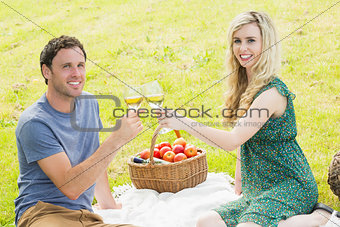 Sweet young couple having picnic