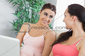 Happy cute women having a conversation