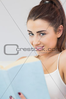 Beautiful woman holding a book