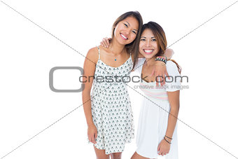 Two cute asian women posing for the camera