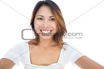 Pretty asian woman smiling at the camera