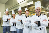 Team of chefs smiling at the camera