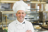 Mature head chef posing with crossed arms