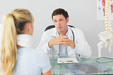 Concerned doctor having an appointment with a patient