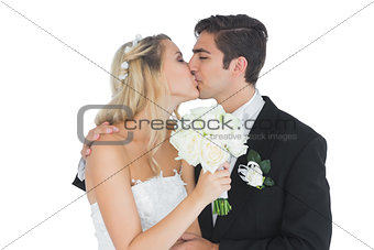 Young couple holding a white bouquet