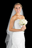 Beautiful young bride posing holding a bouquet