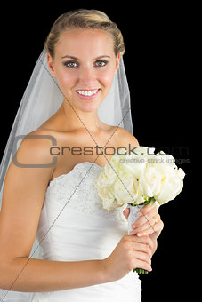 Lovely bride posing smiling at camera