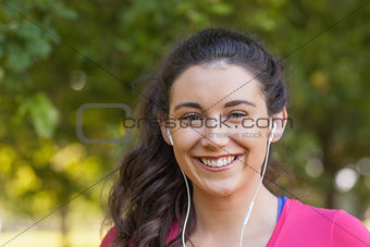 Content young woman listening to music
