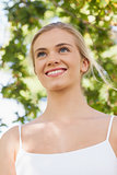 Cute blonde woman smiling while posing