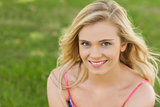 High angle view of beautiful young woman smiling at camera