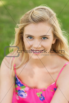 Joyful young woman smiling at camera