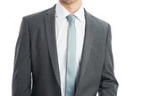 Mid section of businessman wearing suit