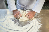 Close up of chef preparing dough