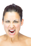 Front view of furious brunette woman yelling at camera