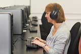 Female mature student working on computer